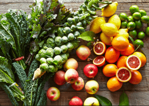 a group of fruits and vegetables on a wood surface Healthy Weight Loss Diets Bradford